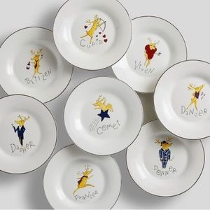 Complete sets of discontinued Pottery Barn Reindeer plates, glasses, and rings.